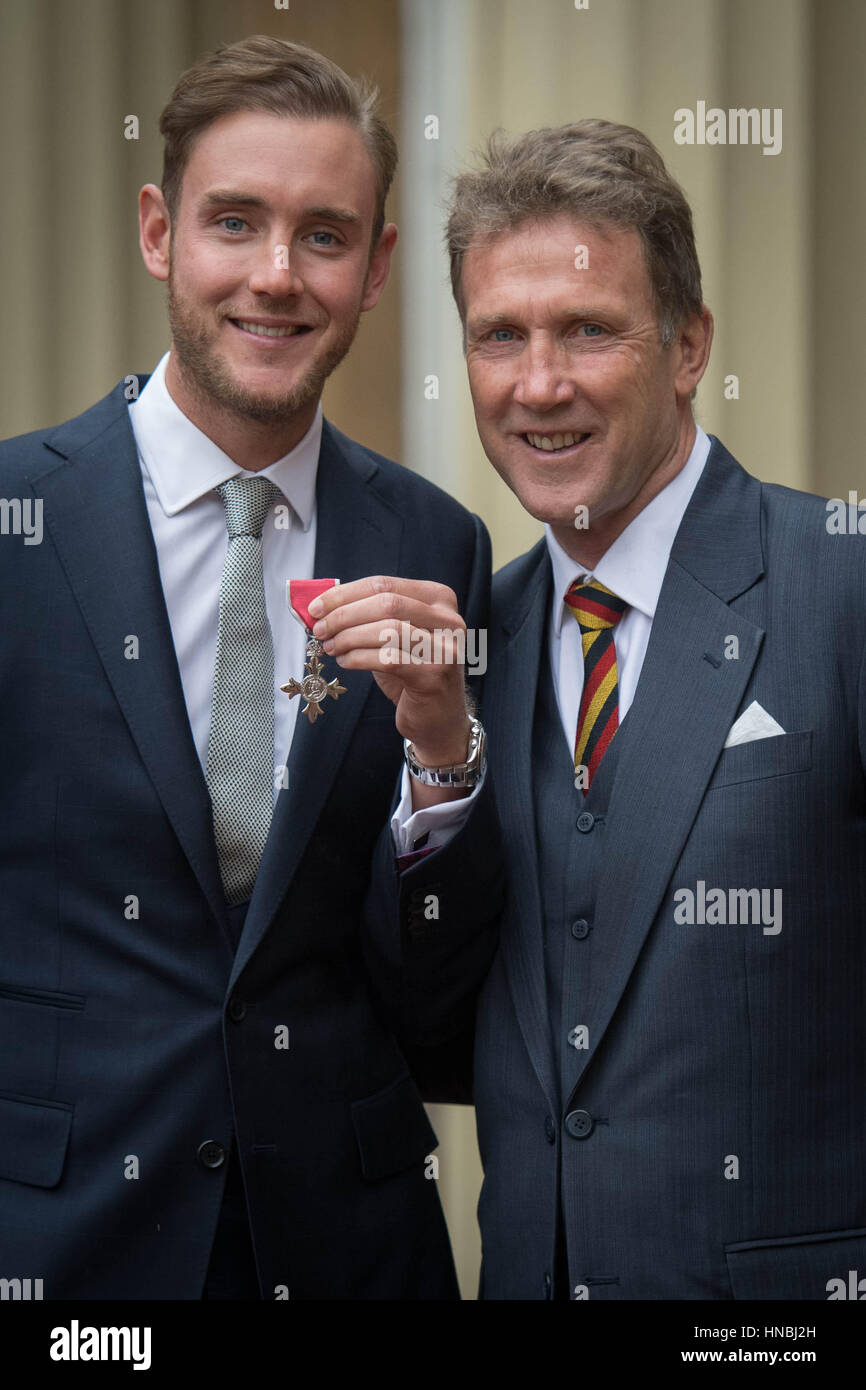England cricketer Stuart Broad with his father Chris after being made a Member of the Order of the British Empire (MBE) by the Prince of Wales at an Investiture ceremony at Buckingham Palace in London. Stock Photo