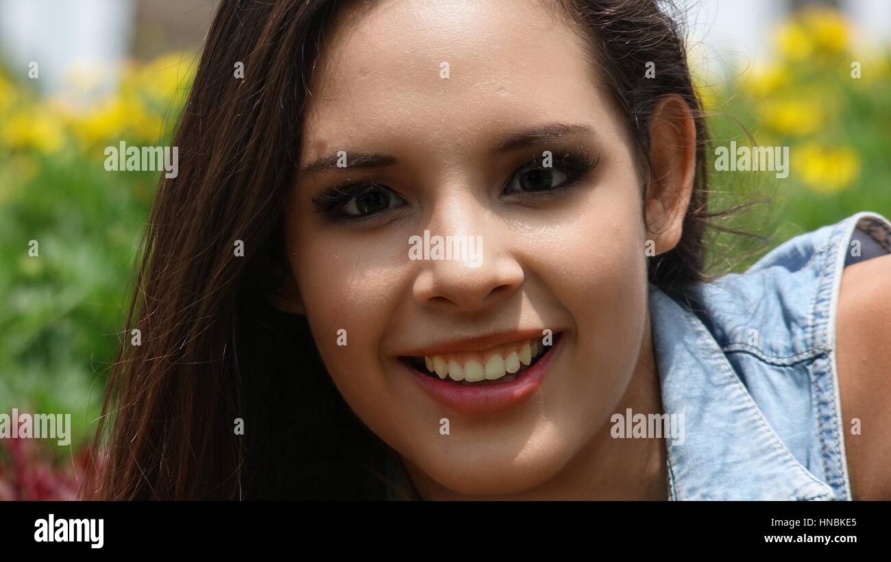 Ethnic teen smiling hi-res stock photography and images - Alamy