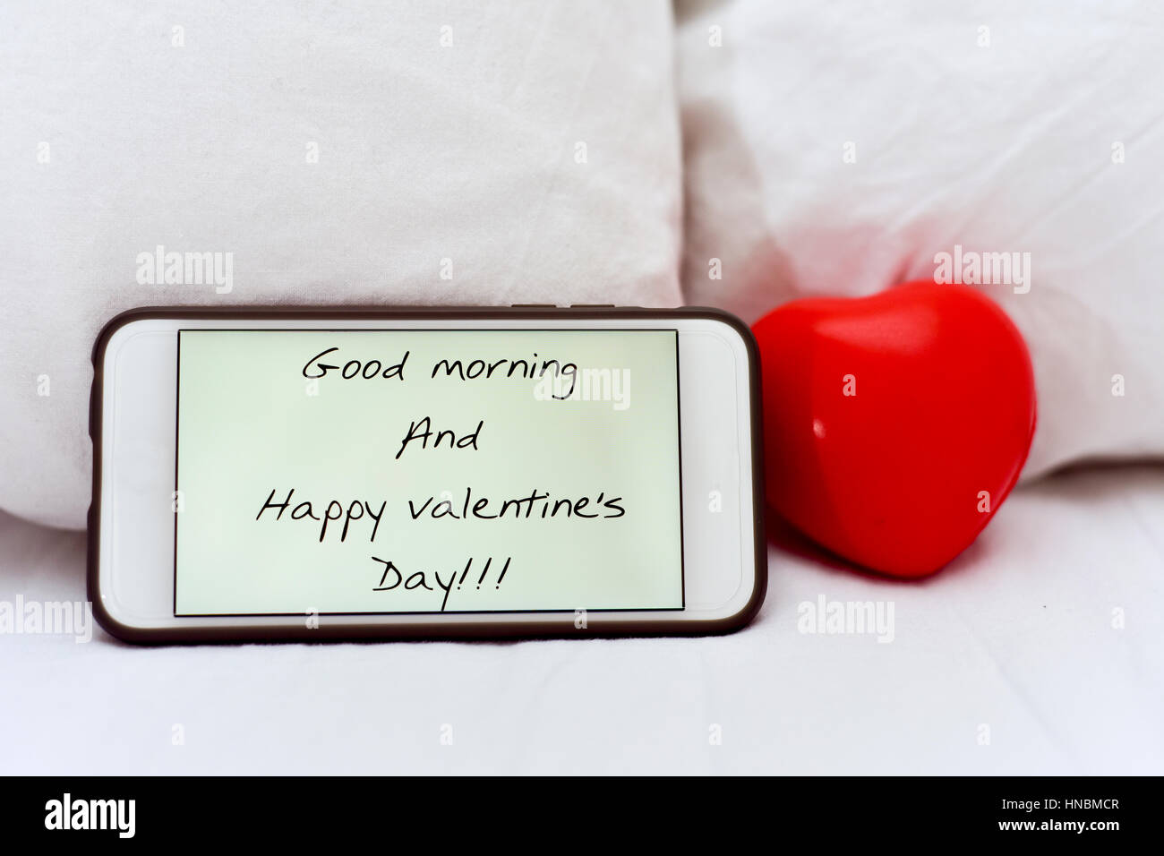 A Smartphone With The Text Good Morning And Happy Valentines Day