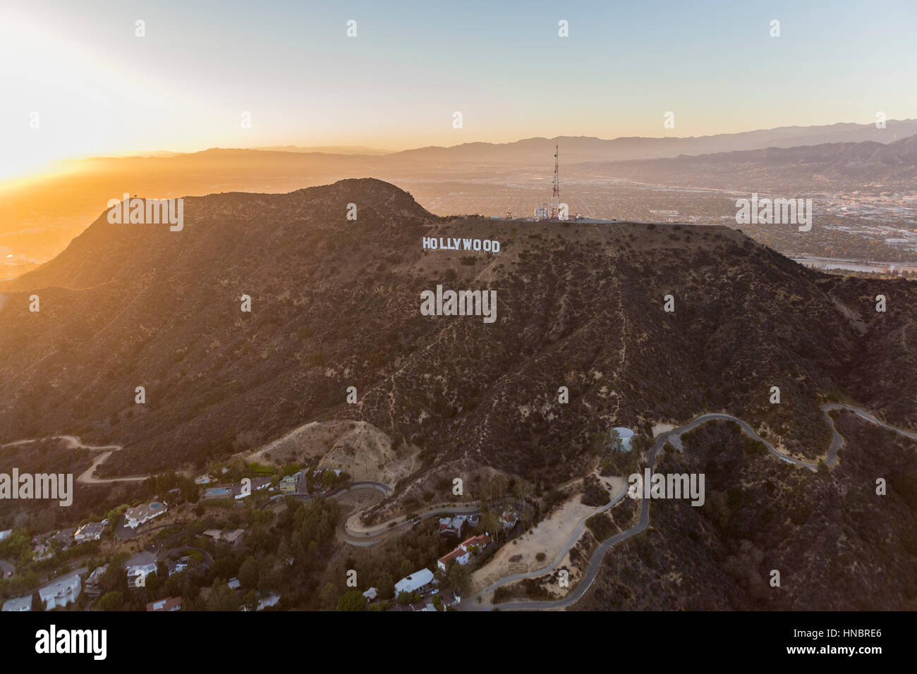 Los Angeles, California, USA - July 21, 2016:  Sunset aerial of the Hollywood Sign in Griffith Park. Stock Photo