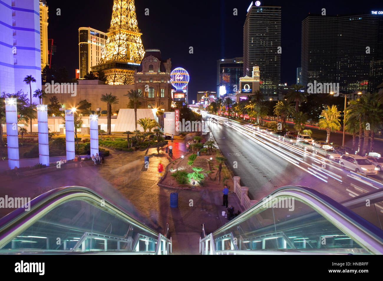 Las Vegas, Nevada, USA - October, 6th 2010:   The Eiffel Tower, Planet Hollywood and other landmarks entertain tourists on a warm desert night. Stock Photo