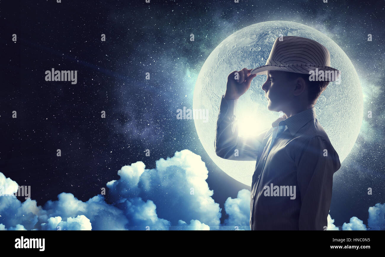 Profile image of cute boy and night sky background Stock Photo - Alamy