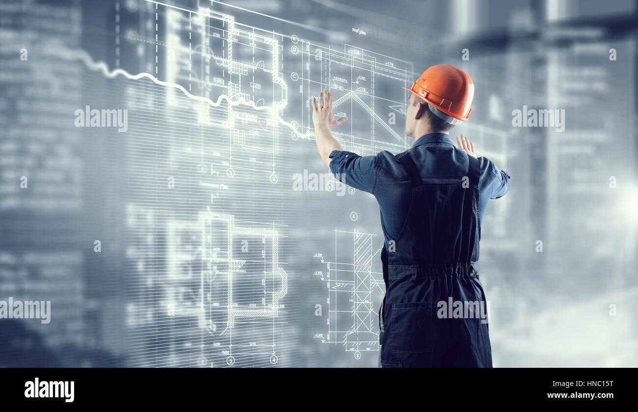 Engineer Computer Desk Back View Back view of engineer man working with virtual panel Stock Photo - Alamy
