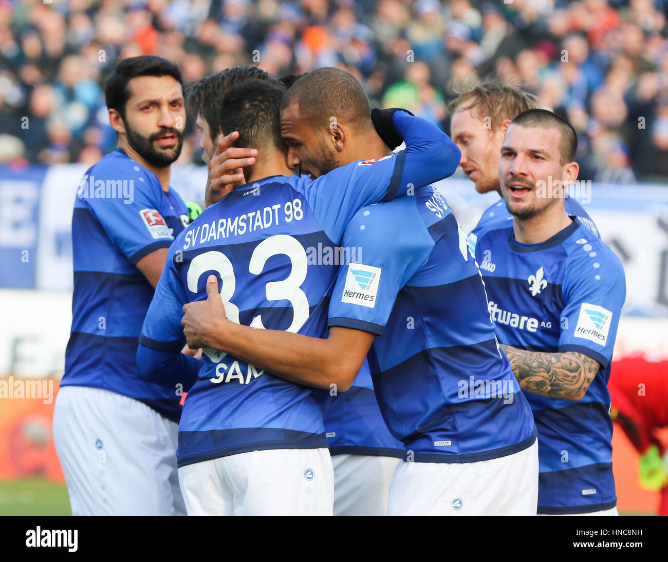 Darmstadt, Germany. 11th Feb, 2017. Darmstadt's players celebrate Terrence Boyd (2.v.r.), after he scored 1:0, to the left is Aytac Sulu, 2.v.l. Sidney Sam, to the right Jerome Gondorf during the German Bundesliga soccer match between Darmstadt 98 and Borussia Dortmund at the Jonathan Heimes stadium in Darmstadt, Germany, 11 February 2017. (EMBARGO CONDITIONS - ATTENTION: Due to the accreditation guidlines, the DFL only permits the publication and utilisation of up to 15 pictures per match on the internet and in online media during the match.) Photo: Frank Rumpenhorst/dpa/Alamy Live News Stock Photo