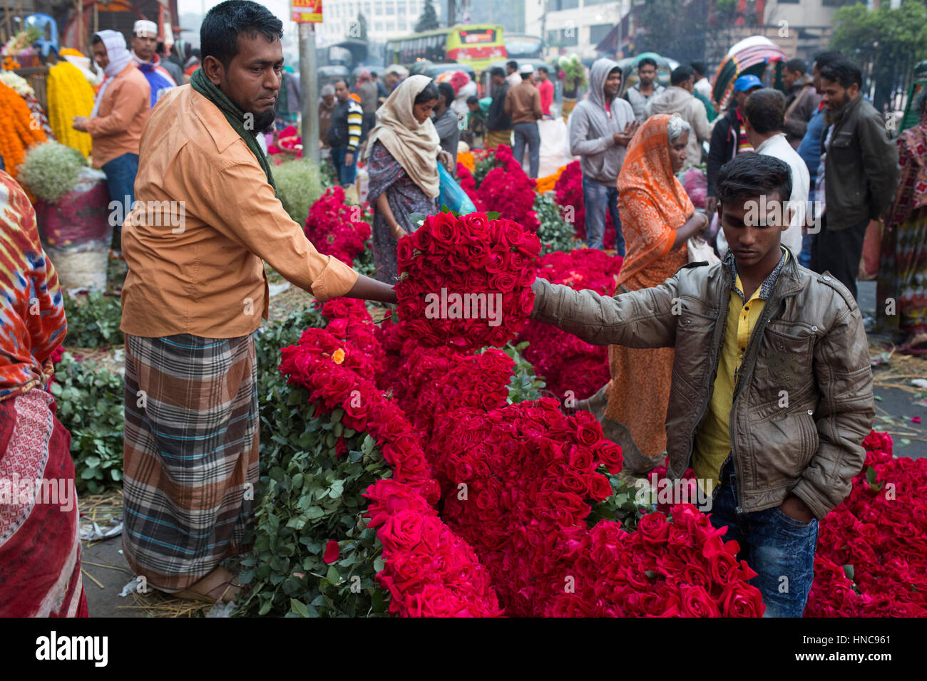 Dhaka, Bangladesh. 11th February 2017.People are busy with trade of flower in Shahbag flower market in Dhaka, Bangladesh on February 11, 2017. Thousand of people come this market at early morning to buy flowers as vendors bring their bloom from the southern region of the country.  Shahbag is famous for the flower market. It is the largest flower market of Bangladesh. Here flower are sell in whole-sell and retail price.These flowers are come from different districs in Bangladesh. Credit: zakir hossain chowdhury zakir/Alamy Live News Stock Photo