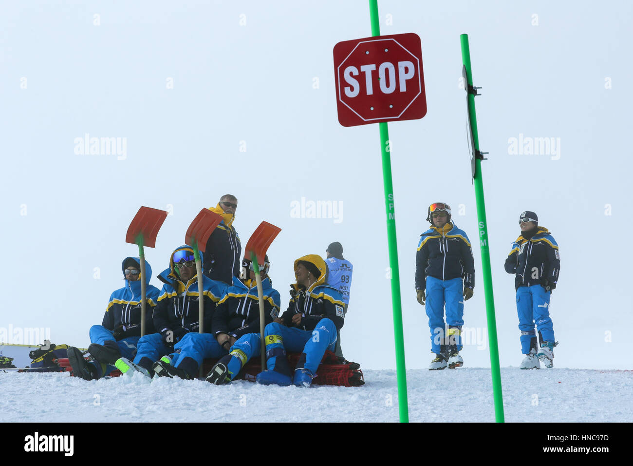St. Moritz, Switzerland. 11th Feb, 2017. Track marshals waiting to go ...