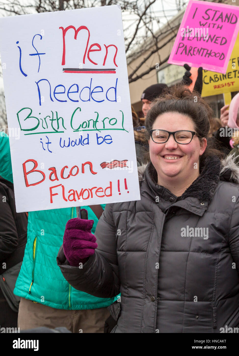 Ferndale, Michigan, USA. 11th February 2017. Supporters of Planned Parenthood far outnumbered opponents as both sides rallied outside Planned Parenthood clinics in metro Detroit. The Trump administration says it will deny federal funds to Planned Parenthood for women's health services because the agency helps some women obtain legal abortions. Credit: Jim West/Alamy Live News Stock Photo