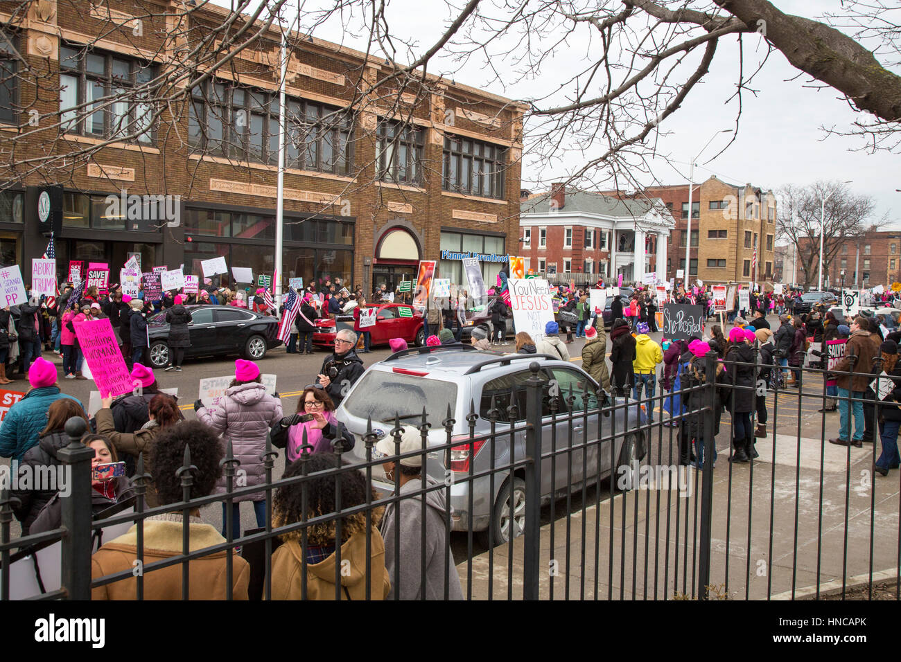 Detroit, Michigan USA. 11th February, 2017. Supporters of Planned Parenthood far outnumbered opponents as both sides rallied outside Planned Parenthood clinics in metro Detroit. The Trump administration says it will deny federal funds to Planned Parenthood for women's health services because the agency helps some women obtain legal abortions. Credit: Jim West/Alamy Live News Stock Photo