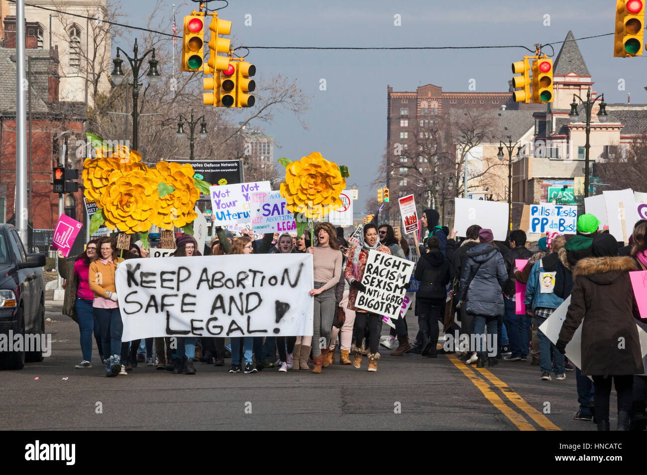 Detroit, Michigan USA. 11th February, 2017. Supporters of Planned Parenthood far outnumbered opponents as both sides rallied outside Planned Parenthood clinics in metro Detroit. The Trump administration says it will deny federal funds to Planned Parenthood for women's health services because the agency helps some women obtain legal abortions. Credit: Jim West/Alamy Live News Stock Photo