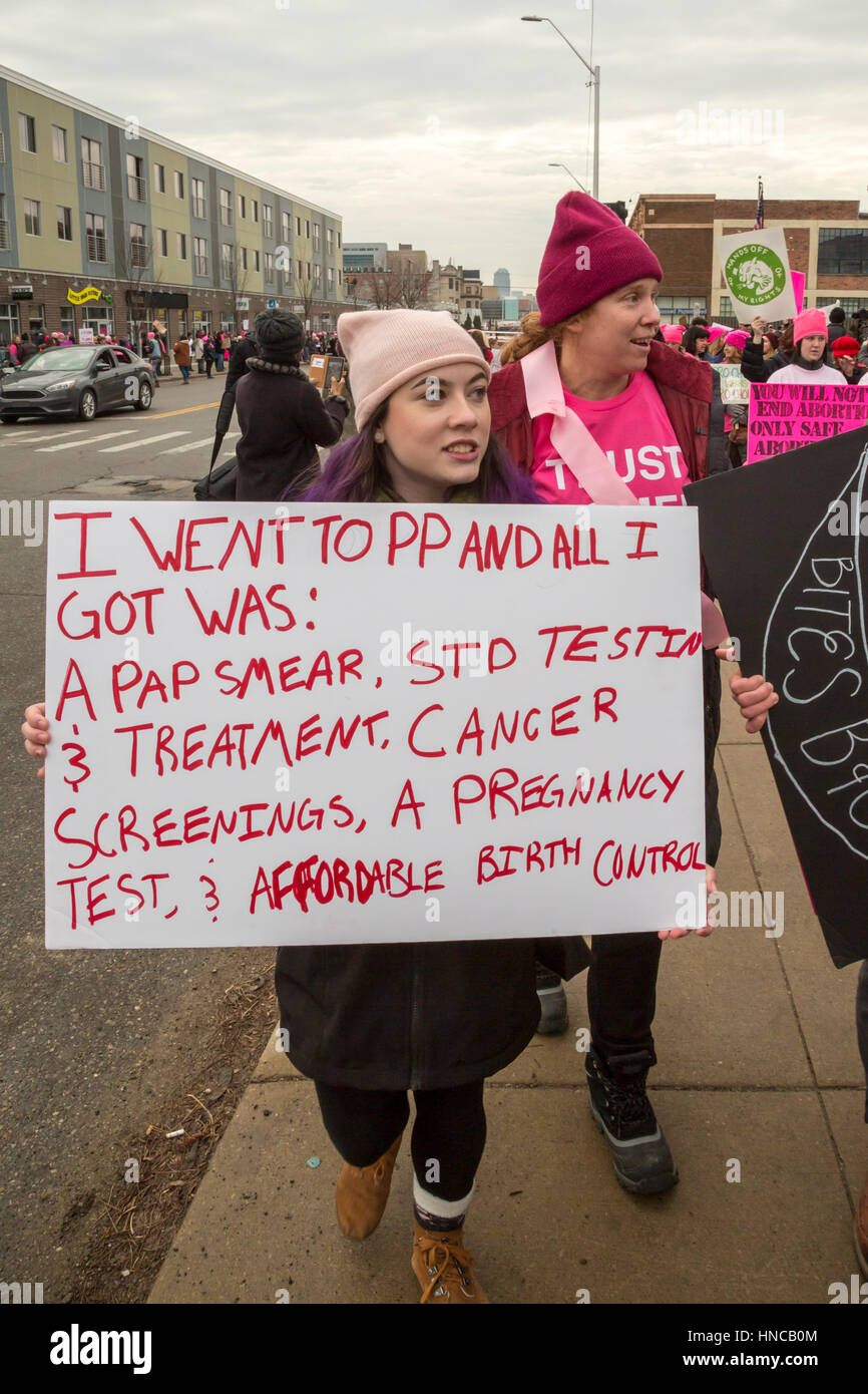 Detroit, Michigan USA. 11th February, 2017. Supporters of Planned Parenthood far outnumbered opponents as both sides rallied outside Planned Parenthood clinics in metro Detroit. The Trump administration says it will deny federal funds to Planned Parenthood for women's health services because the agency helps some women obtain legal abortions. Credit: Jim West/Alamy Live News Stock Photo