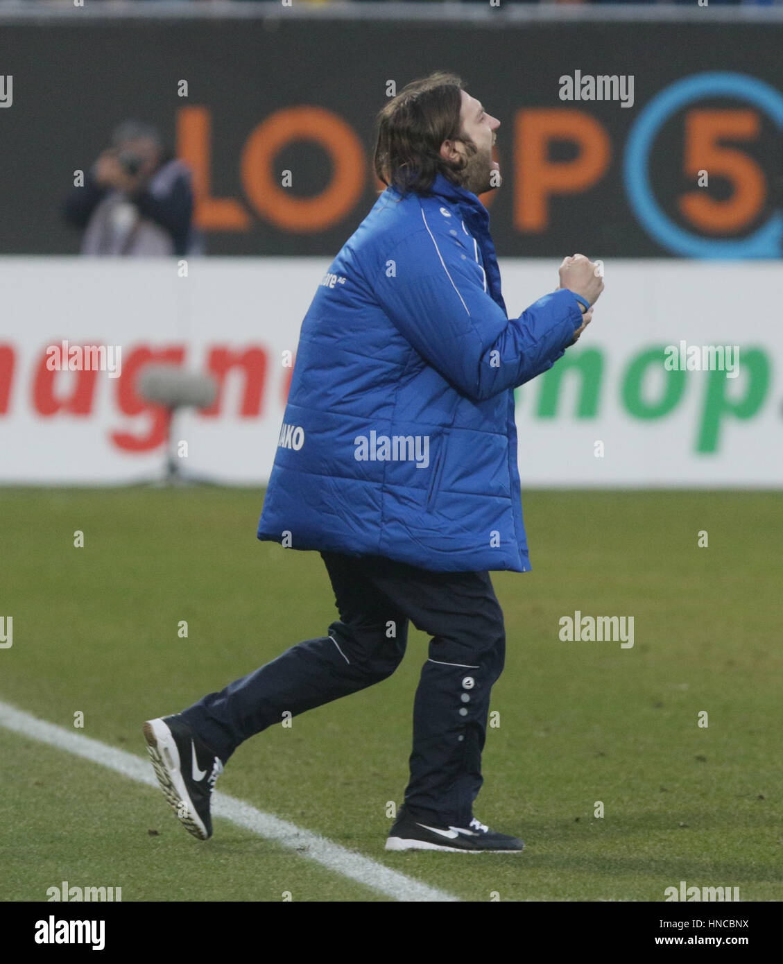 Darmstadt, Germany. 11th Feb, 2017. Darmstadt's coach Torsten Frings celebrates the 2:1 win after the final whistle of the German Bundesliga soccer match between Darmstadt 98 and Borussia Dortmund at the Jonathan Heimes stadium in Darmstadt, Germany, 11 February 2017. Photo: Frank Rumpenhorst/dpa/Alamy Live News Stock Photo