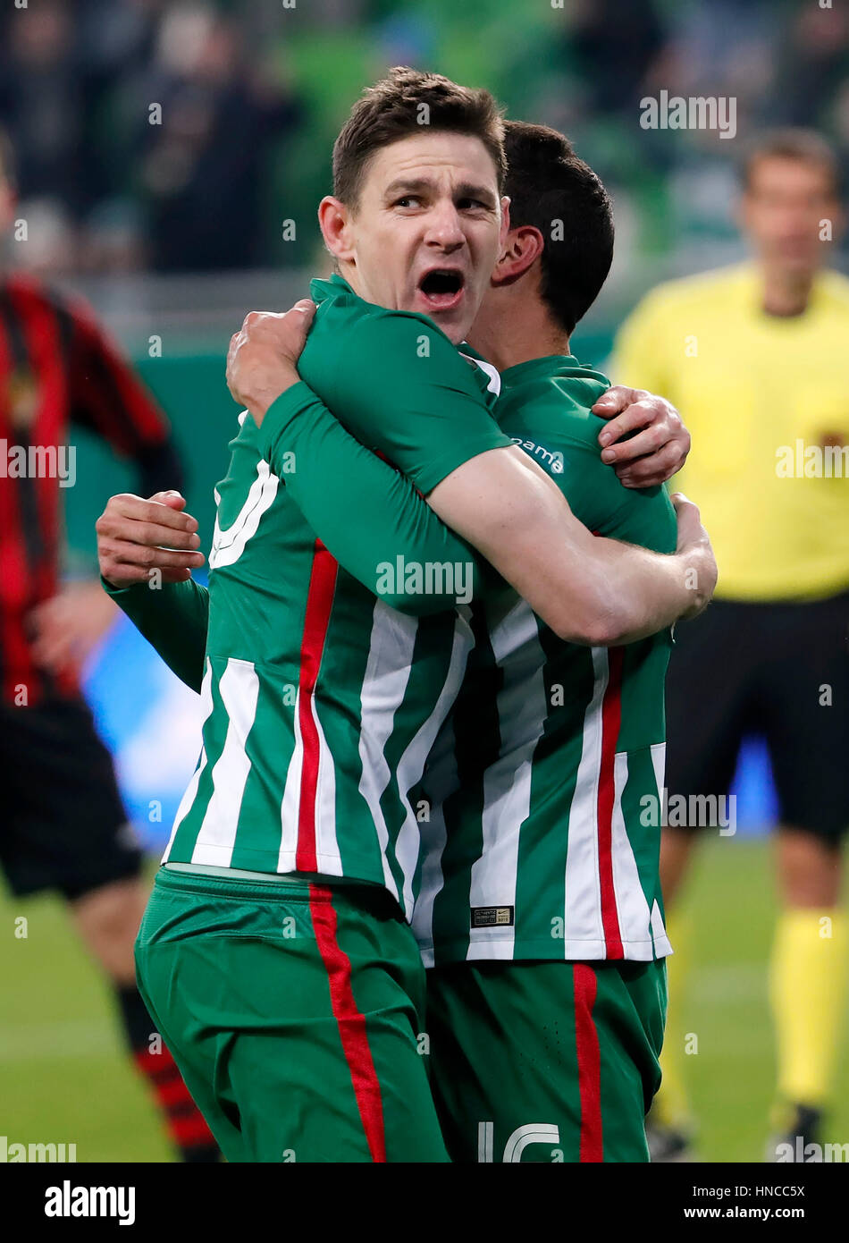 BUDAPEST, HUNGARY - JULY 12: (r-l) Roland Varga of Ferencvarosi TC hugs  goal scorer Stefan
