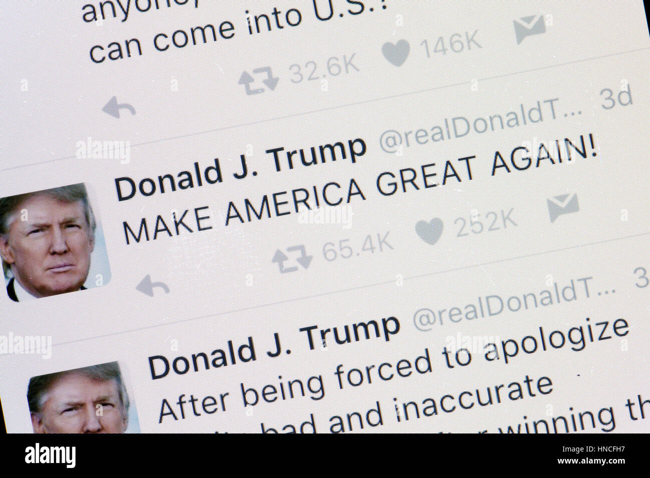 Donald Trump's twitter account with 'Make America Great Again' tweet on mobile phone screen - USA Stock Photo