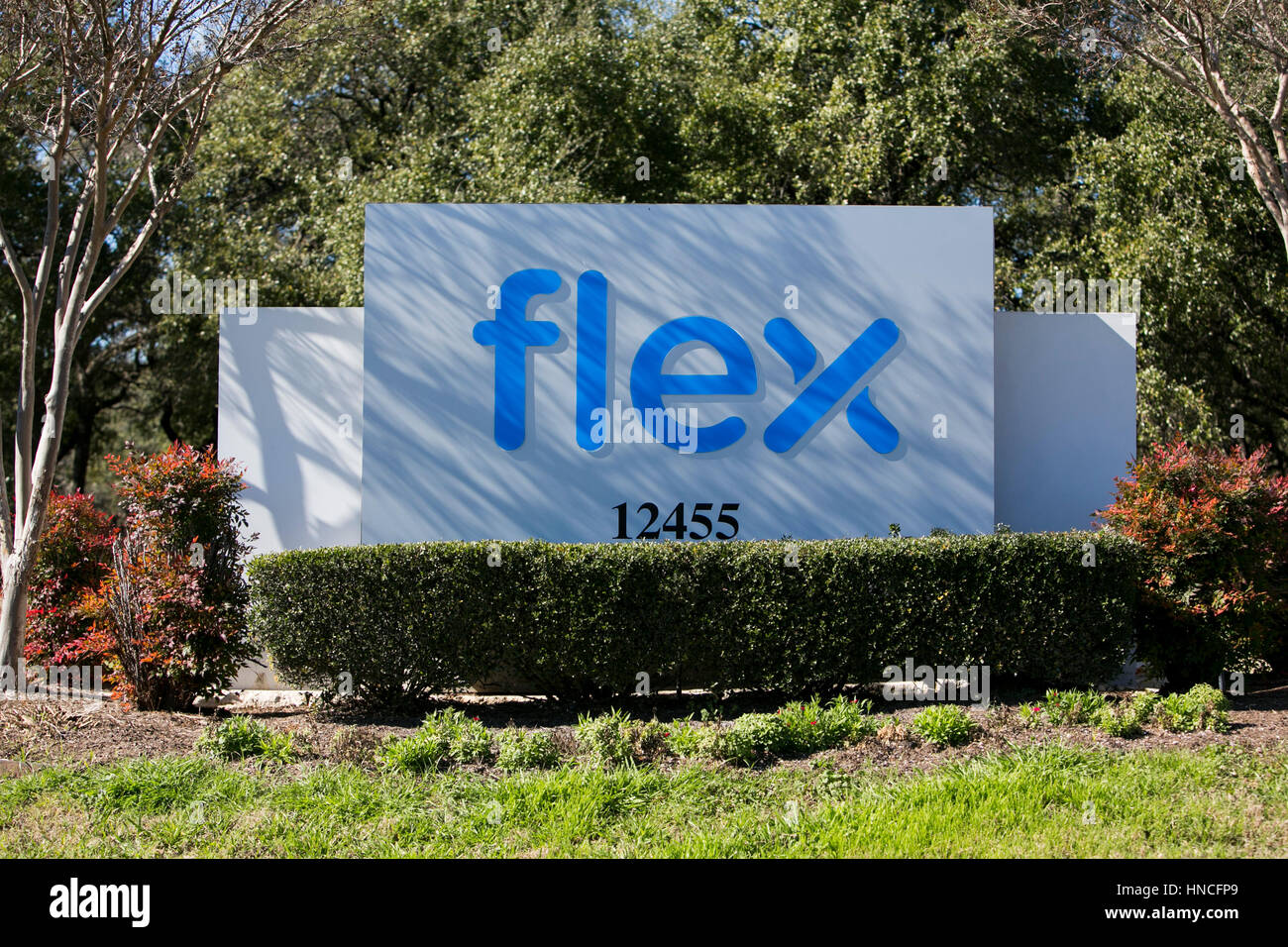 A logo sign outside of a facility occupied by Flex Ltd., in Austin