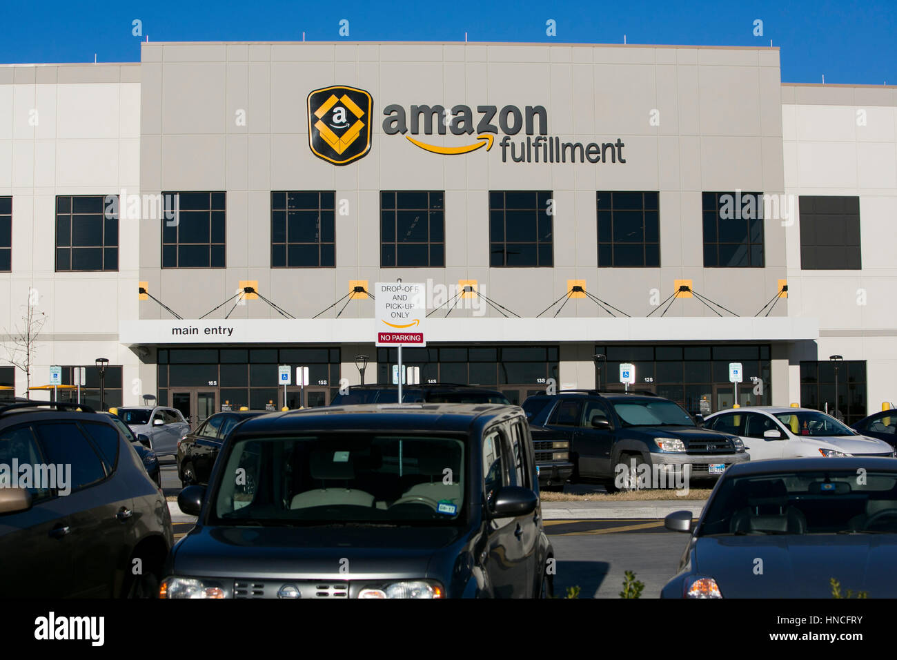 A logo sign outside of a Amazon Fulfillment center in San Marcos, Texas on January 28, 2017. Stock Photo