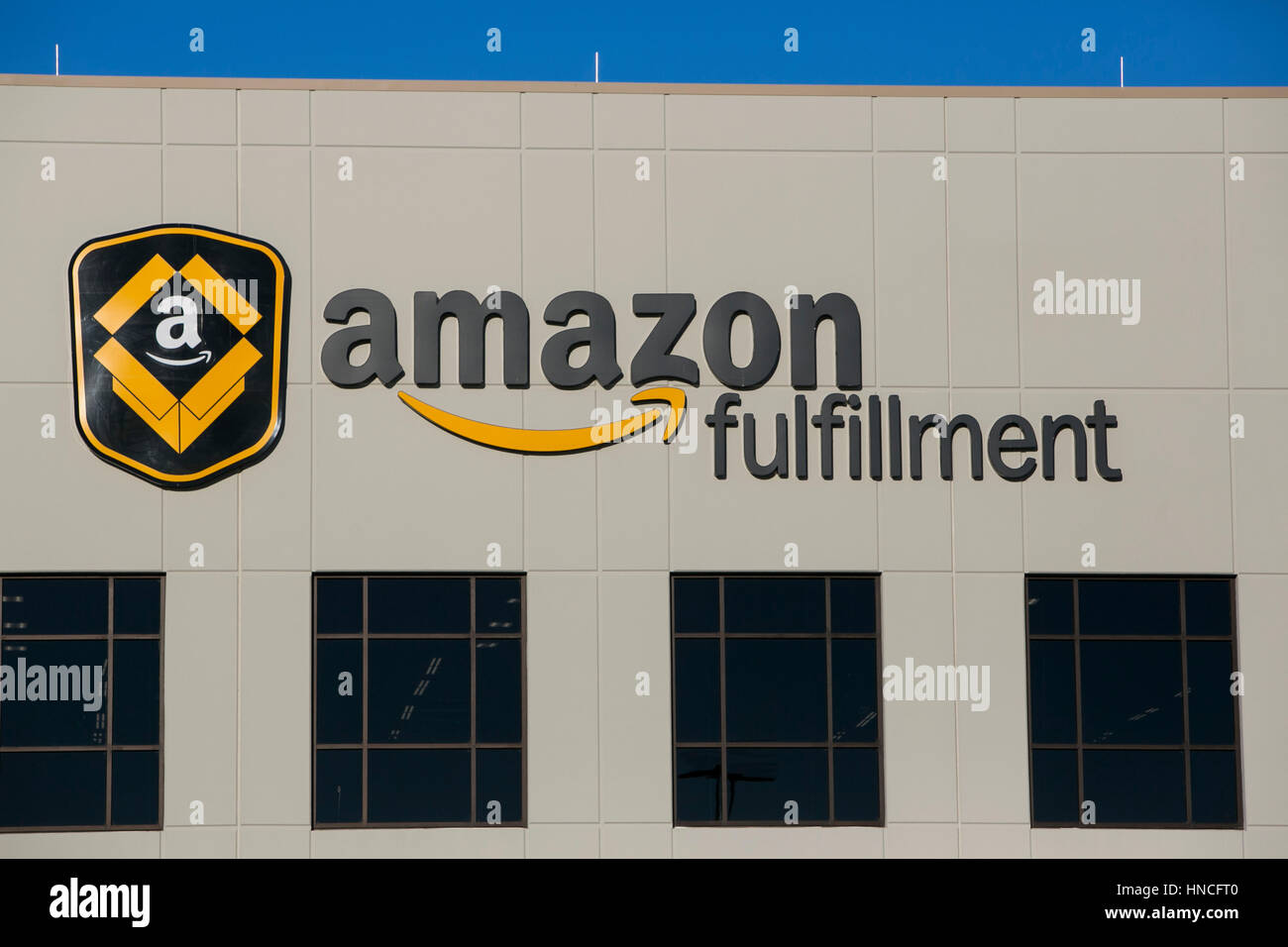 A logo sign outside of a Amazon Fulfillment center in San Marcos, Texas on January 28, 2017. Stock Photo