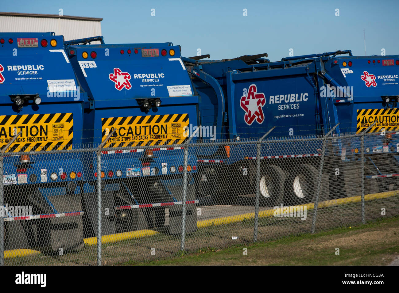 Logo signs on Republic Services, Inc., trucks in San Antonio, Texas on