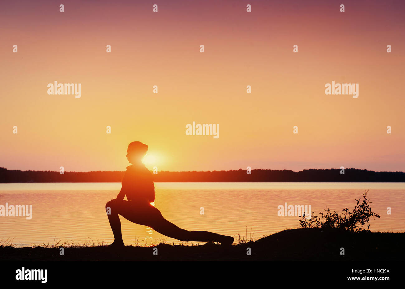 girl at sunset by the lake Stock Photo - Alamy