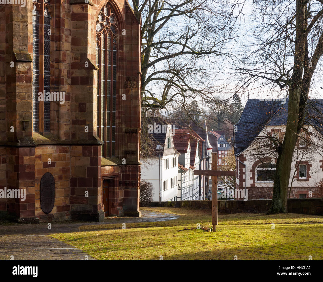 Cross in front of a church. Stock Photo