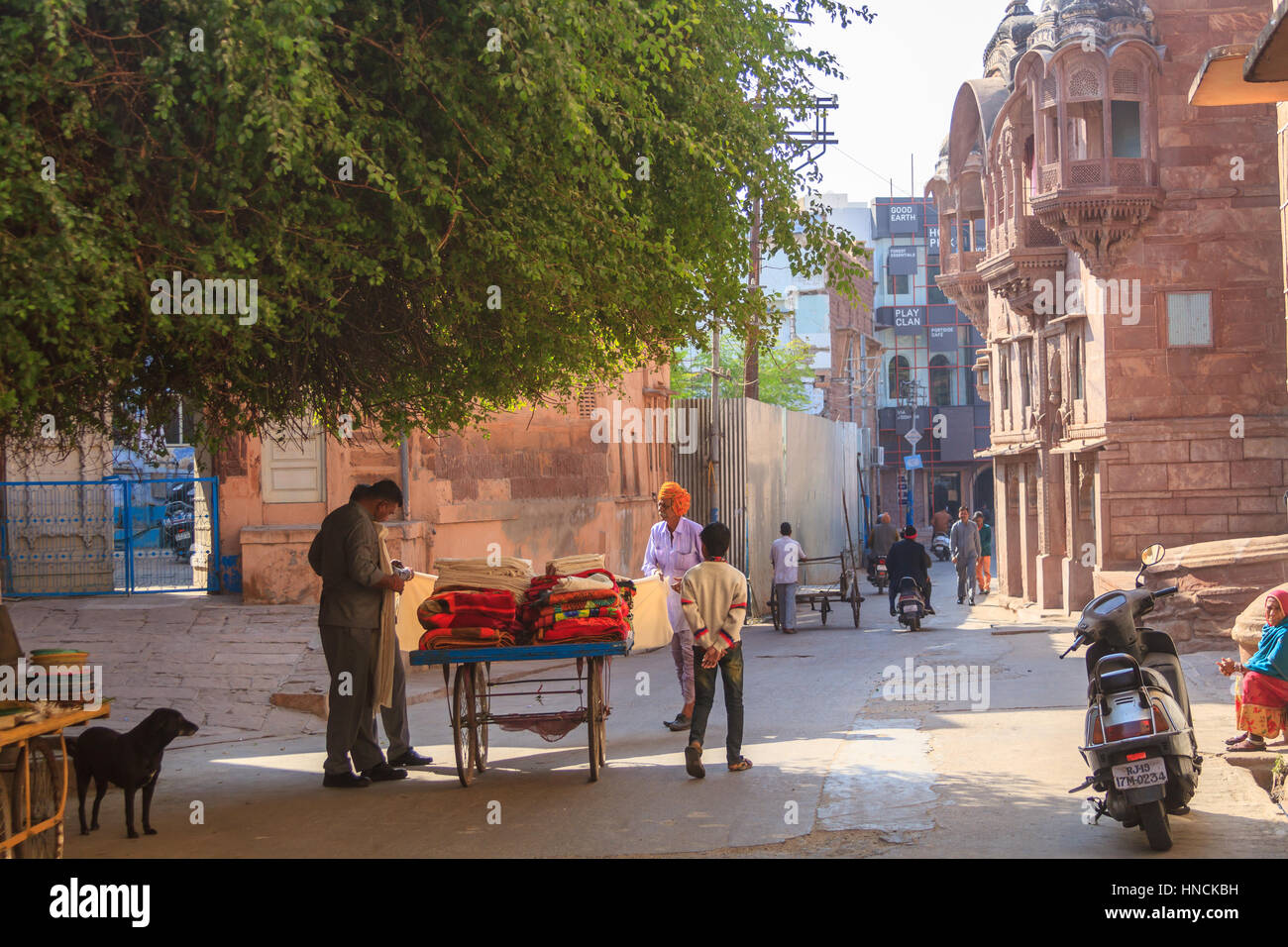 Jodhpur, India, 16th January 2017 - An old man sells blankets in a street in Jodhpur. Stock Photo