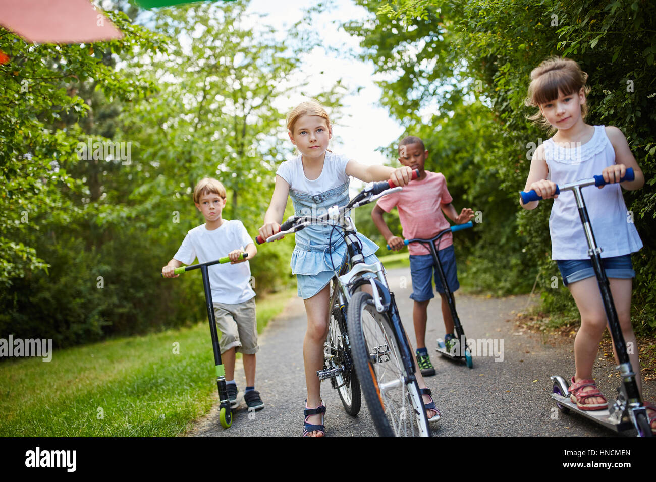 kids riding scooters