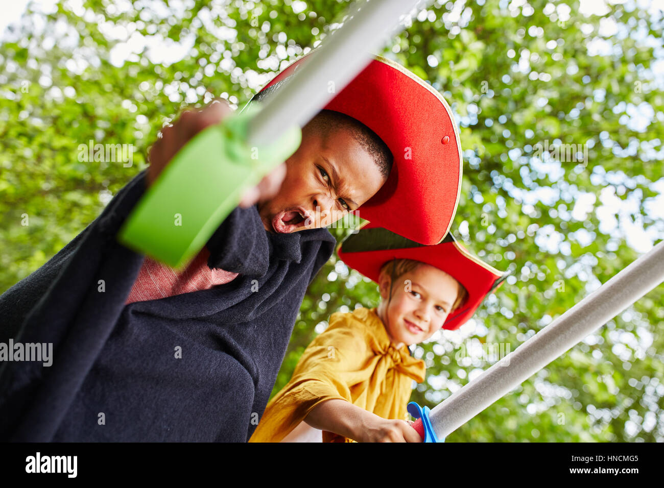 Two children playing in kids theater fantasy class Stock Photo - Alamy