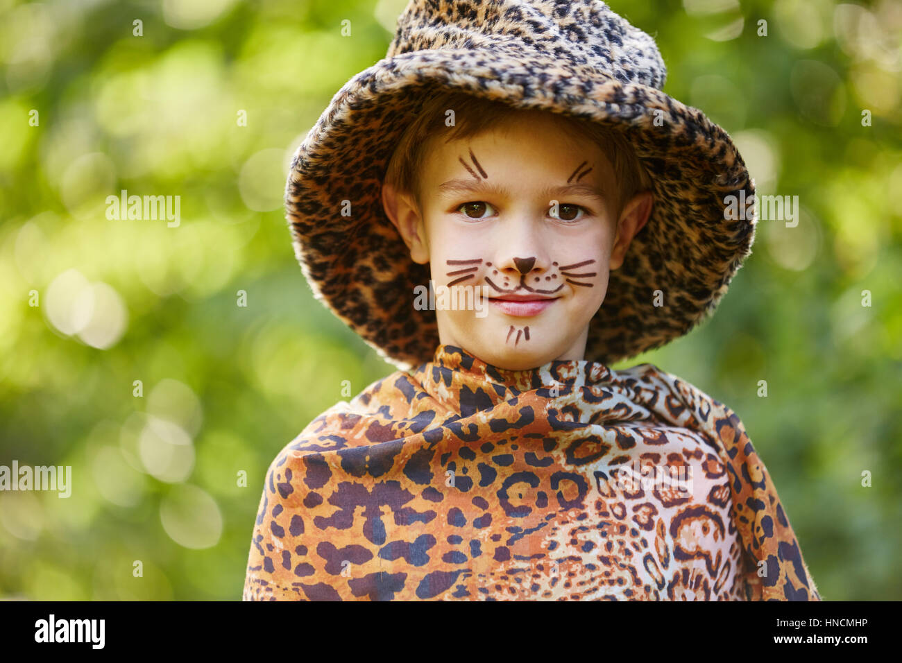 Boy dressed up like leopard after pace painting exceperience Stock Photo