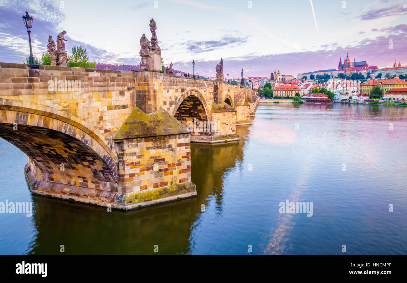 The Charles bridge is located in Prague, Czech Republic. Finished in the XV century, it is a medieval gothic bridge crossing the Vltava river. Its pil Stock Photo
