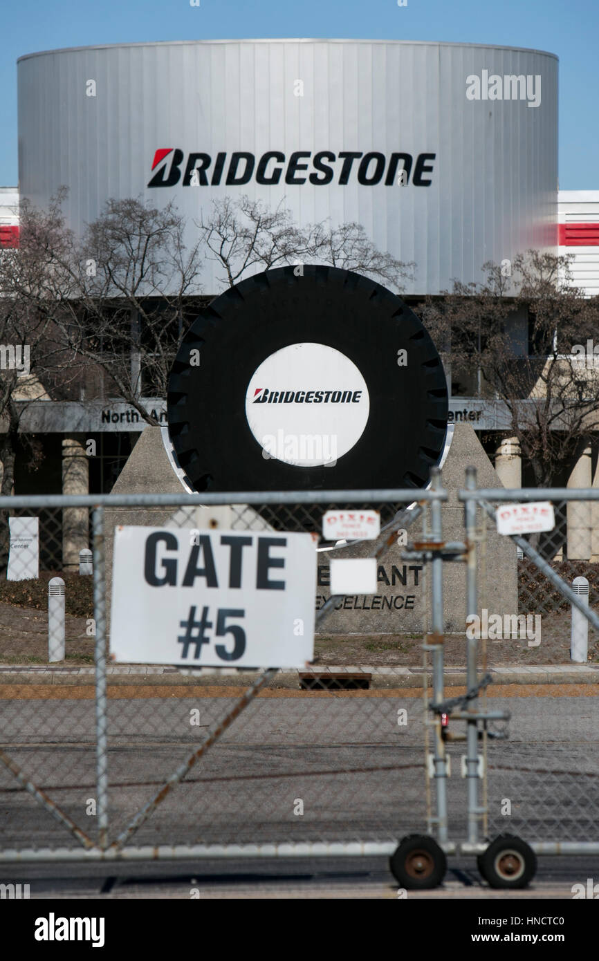 A logo sign outside of a facility occupied by the Bridgestone