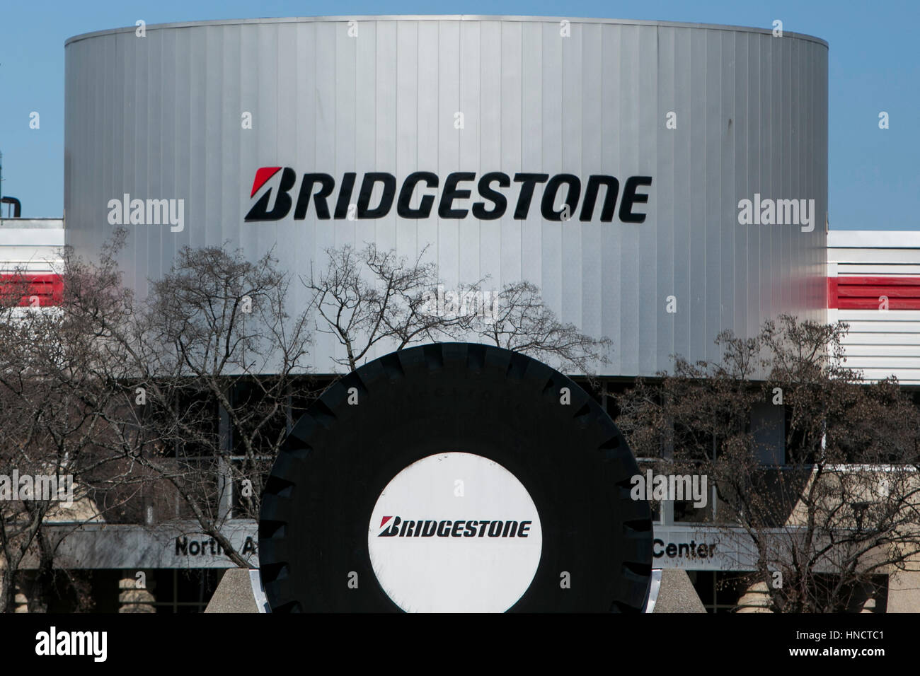A logo sign outside of a facility occupied by the Bridgestone