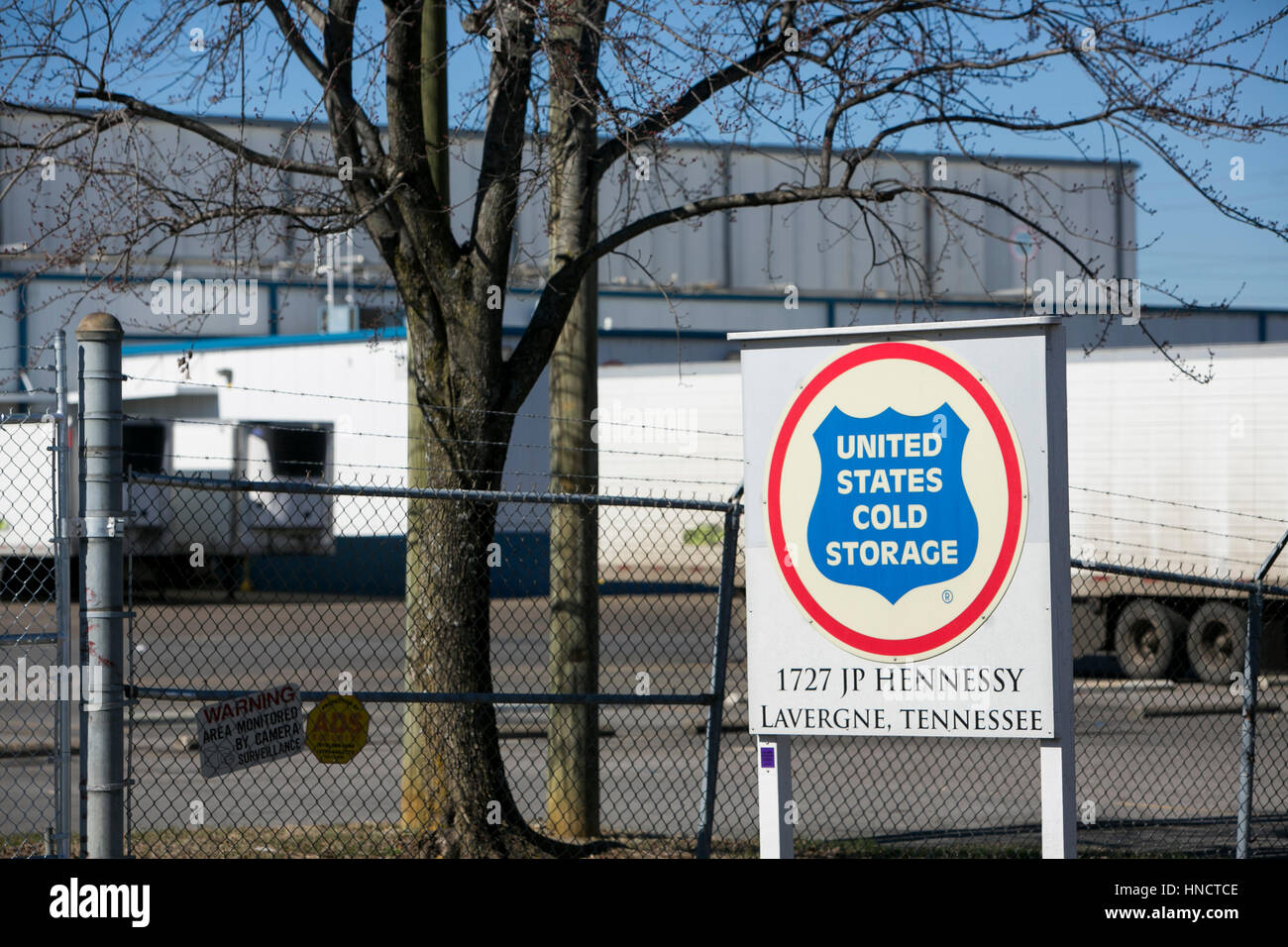 A logo sign outside of a facility occupied by United States Cold Storage in La Vergne, Tennessee on February 4, 2017. Stock Photo