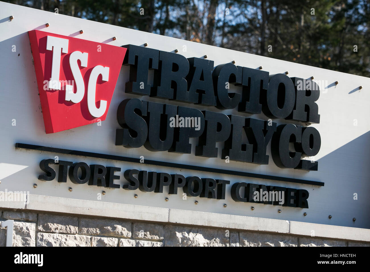 A logo sign outside of the headquarters of the Tractor Supply Company