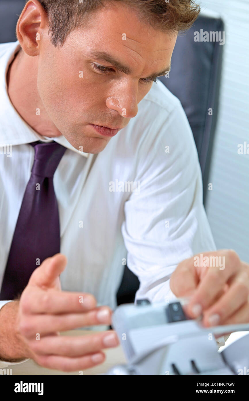 Businessman at work in office Stock Photo