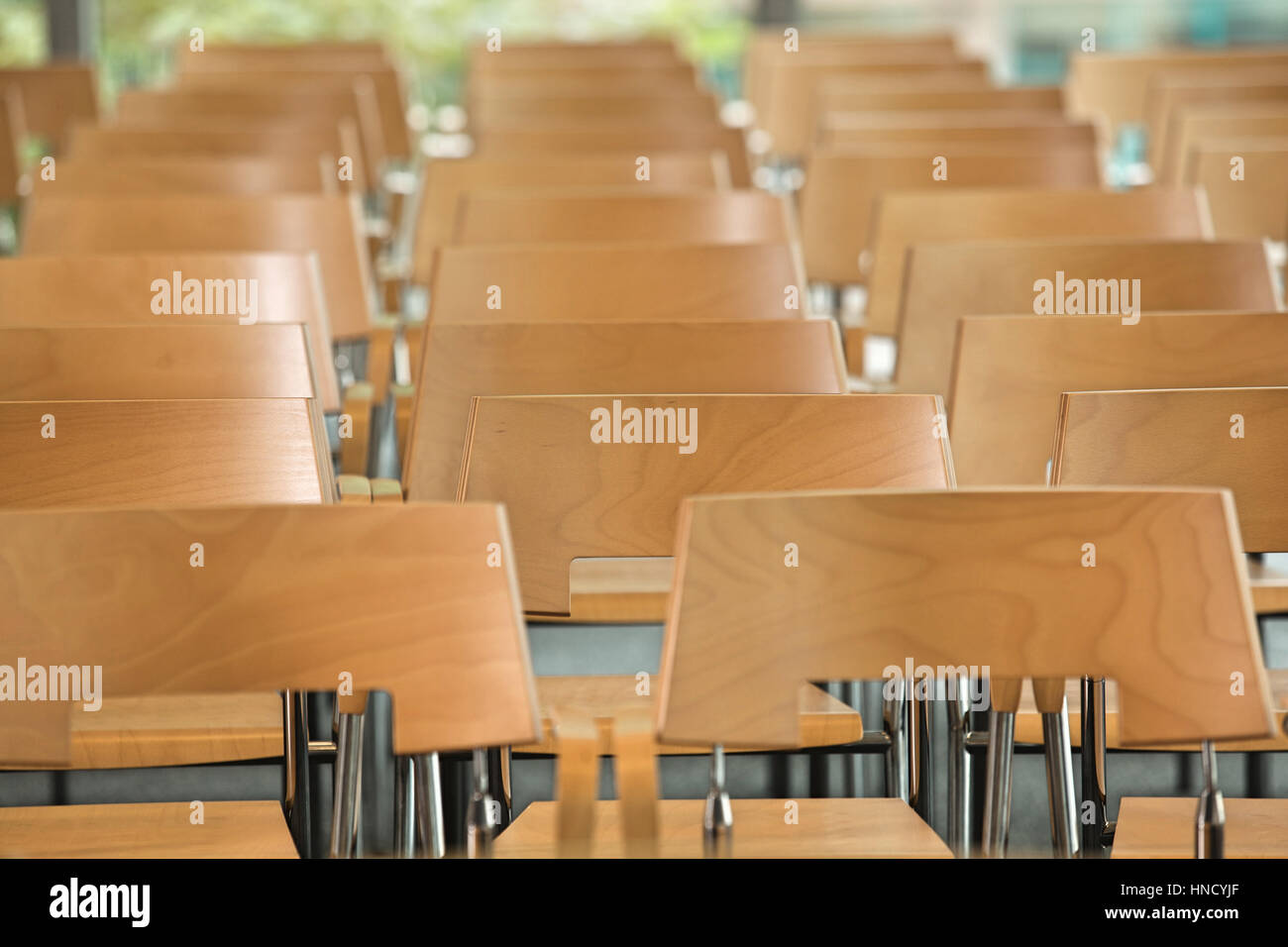 Rows of empty chairs in office Stock Photo
