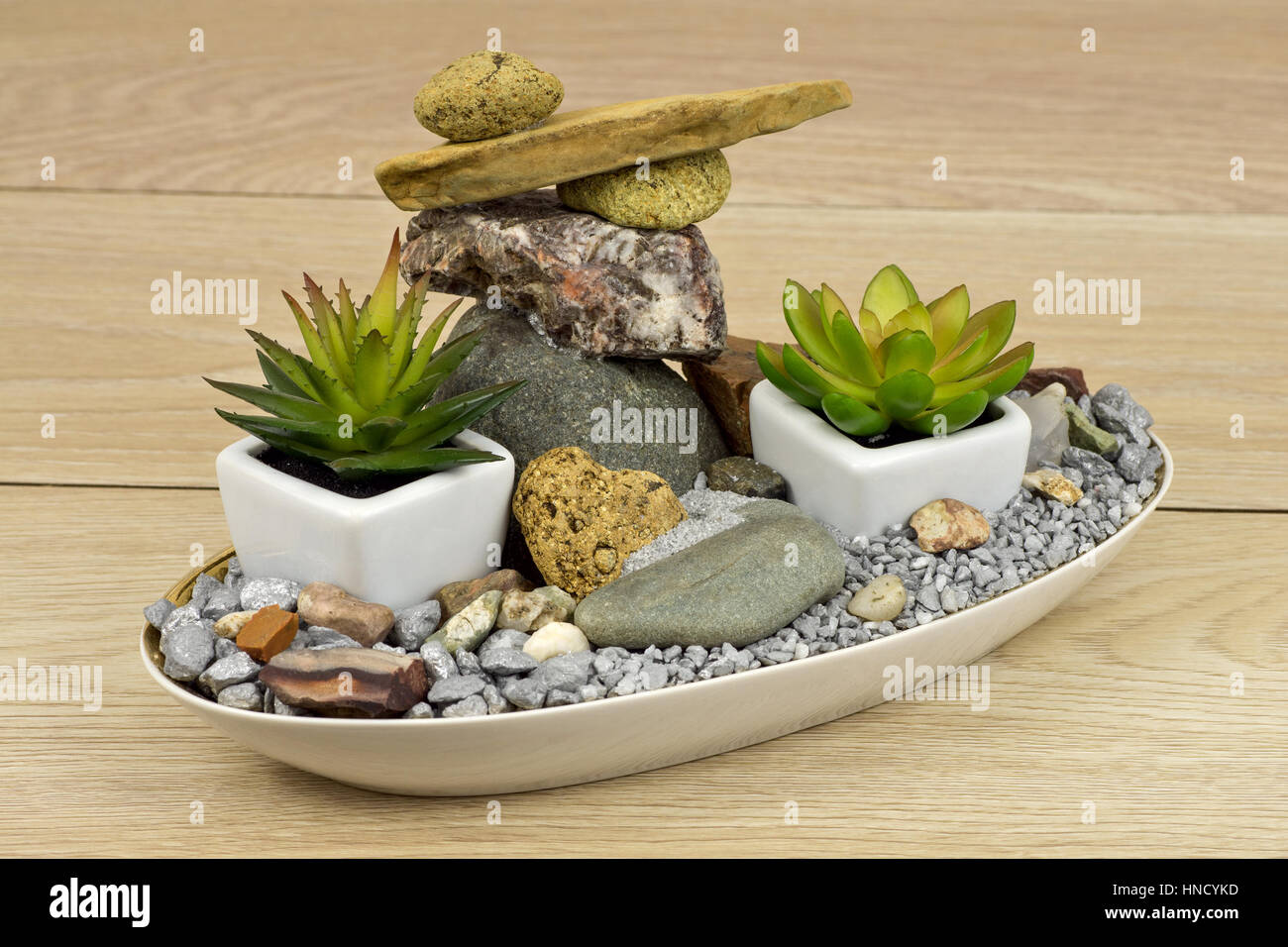 Mini-garden with balanced stones Stock Photo