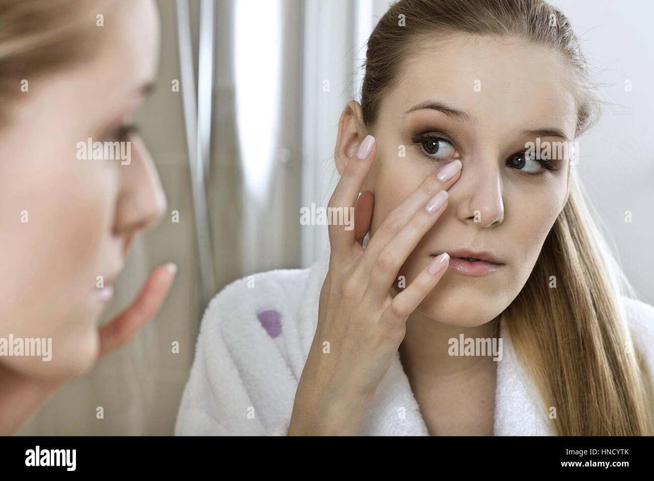 Woman reflaction in mirror Stock Photo Alamy
