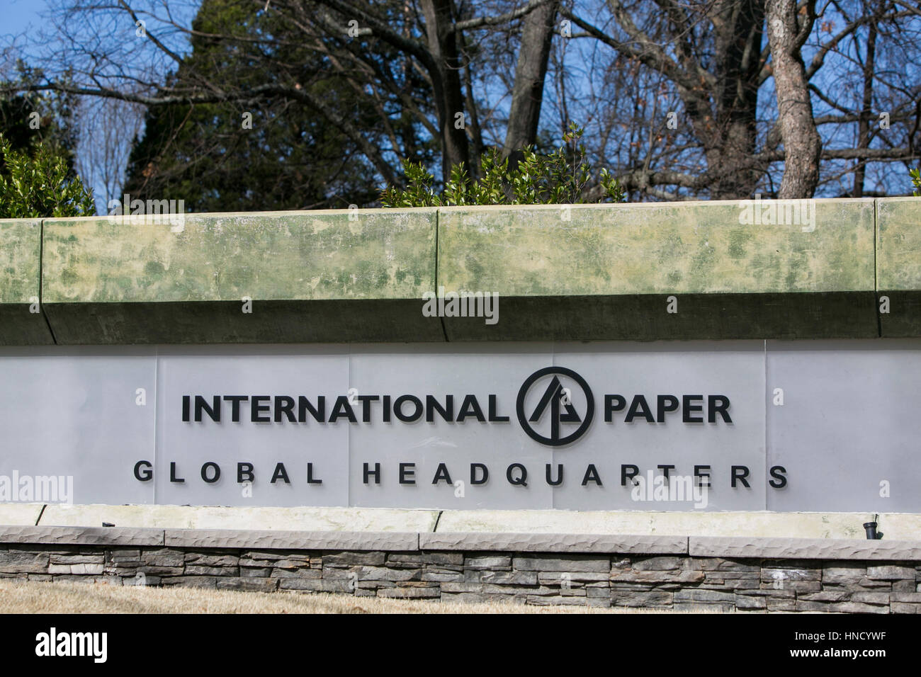 A logo sign outside of the headquarters of The International Paper Company in Memphis, Tennessee on February 5, 2017. Stock Photo