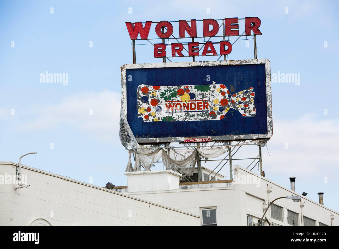 A logo sign outside of the abandoned Wonder Bread and Hostess Cake