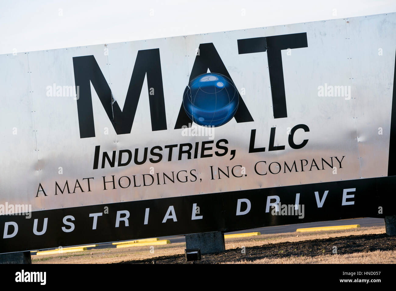 A Logo Sign Outside Of A Facility Occupied By Mat Industries In