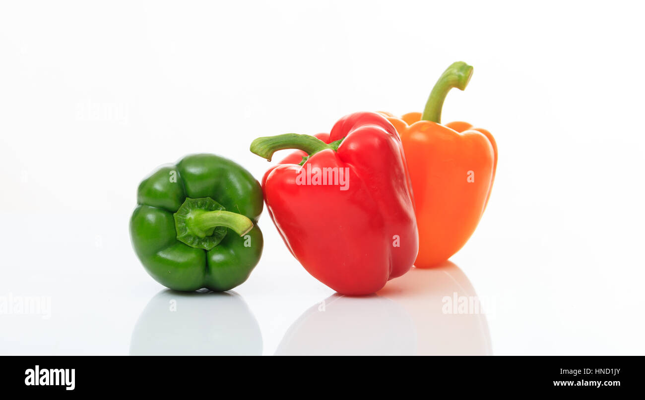 Colorful bell peppers isolated on white background Stock Photo - Alamy