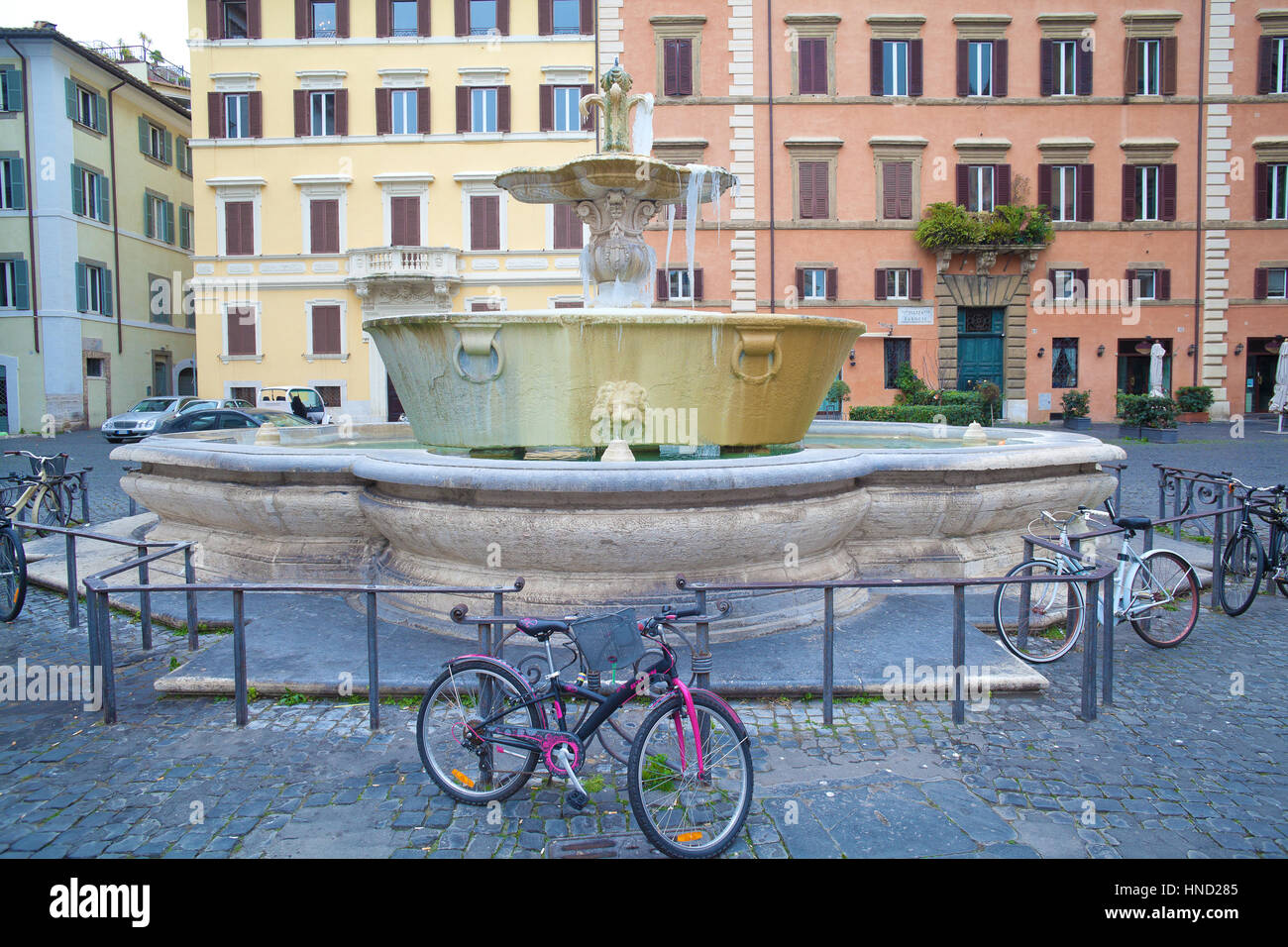 Rome, Italy - January 8, 2017: the twin fountains in piazza Farnese, Rome just in front of french embassy. Some unidentified people visiting and walki Stock Photo