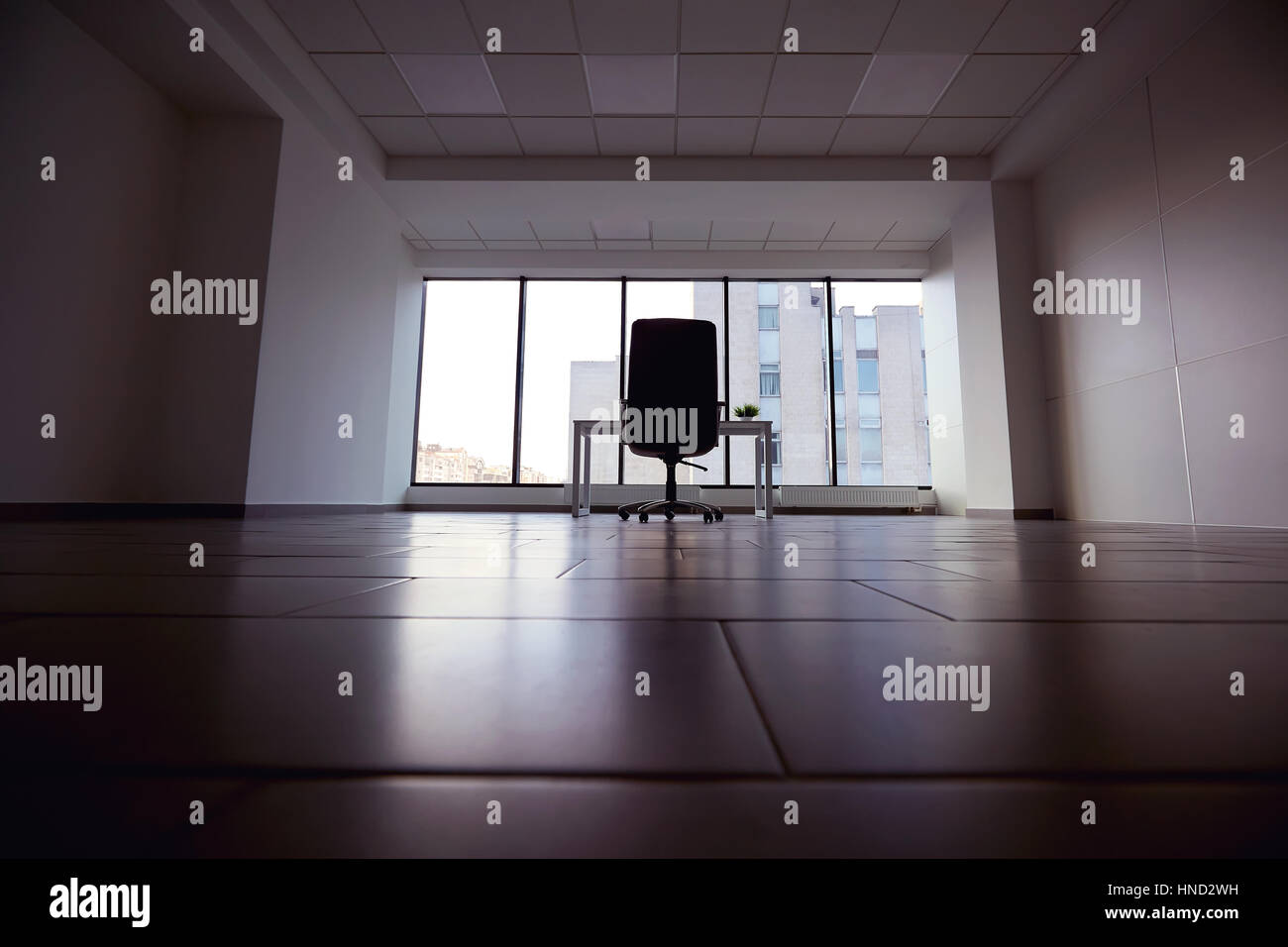 Chair and table in empty modern office Stock Photo