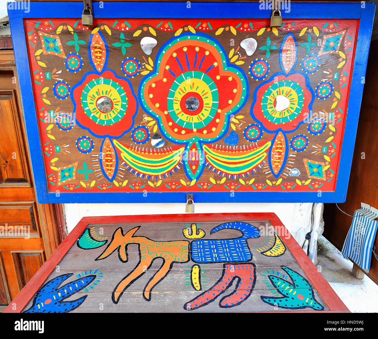 Kas, Turkey-April 4, 2015: Local antiques and artistic souvenirs shops exhibit on their outside many on sale items like trese polychrome covers of woo Stock Photo