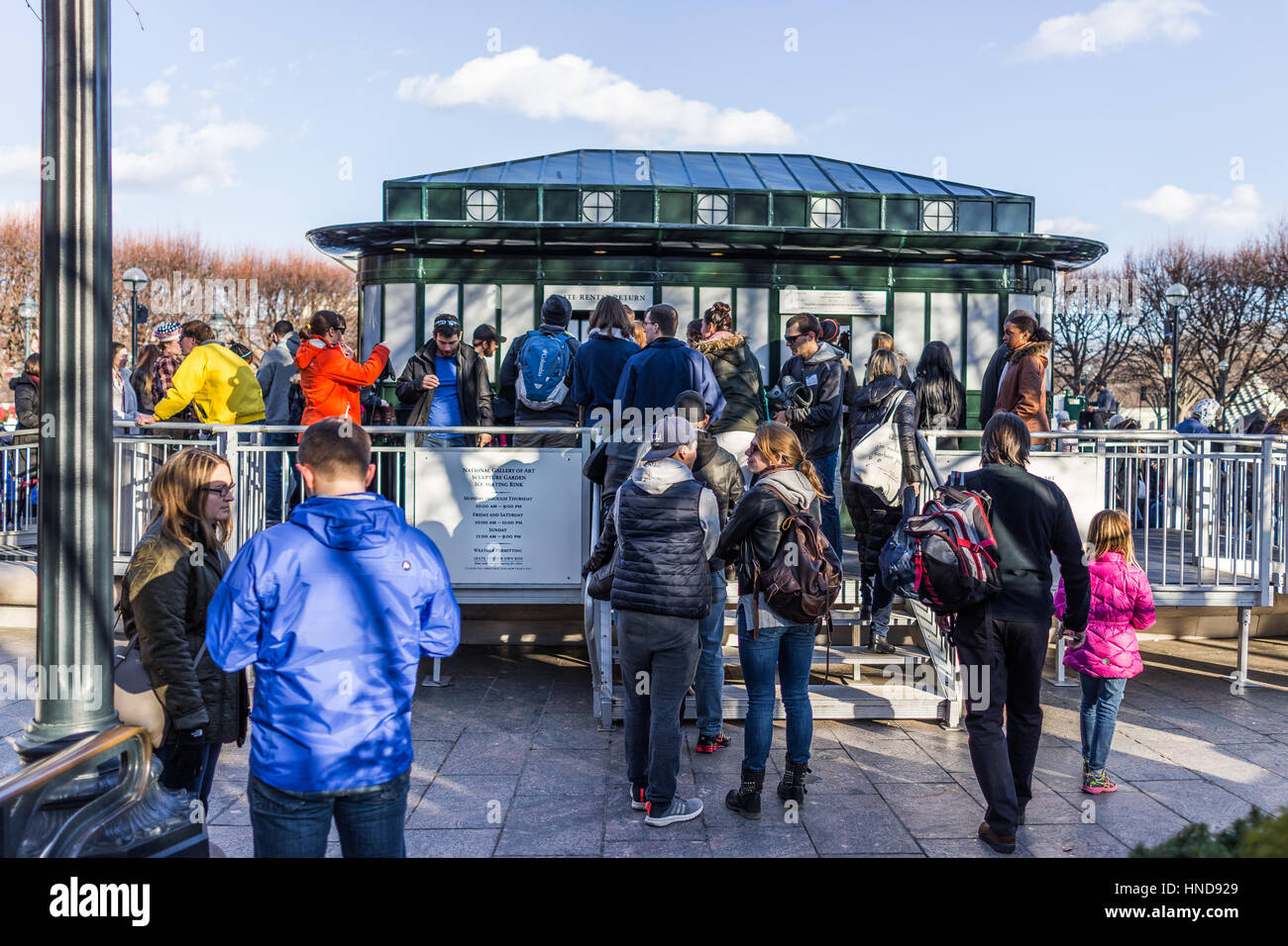 Washington DC, USA - January 28, 2017: People waiting for ice rink to skate in National Gallery of Art Sculpture garden Stock Photo