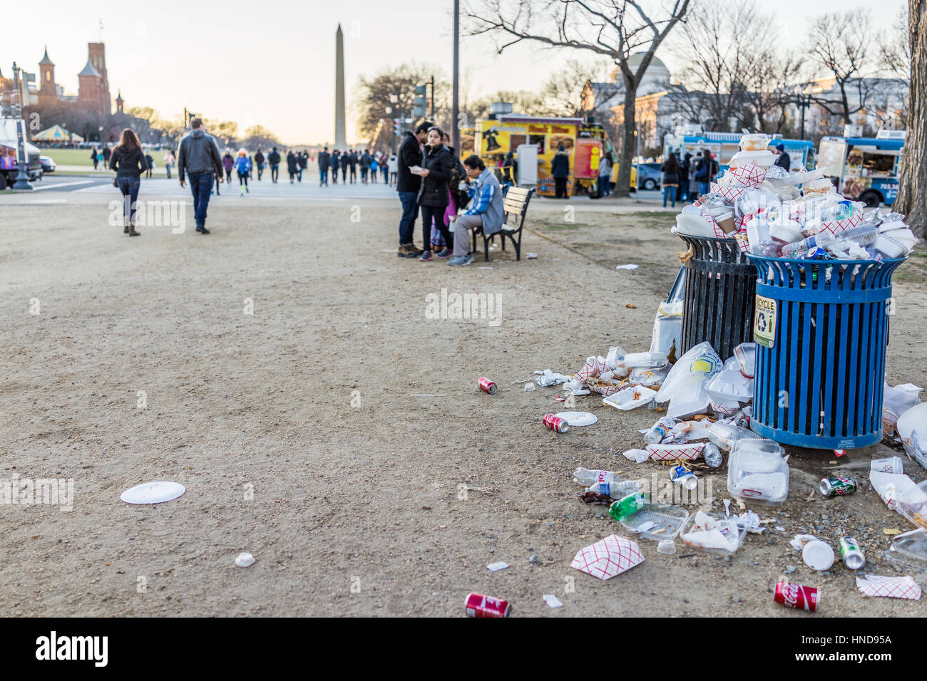 Washington DC, USA January 28, 2017 Overflowing trash bins in National Mall with people