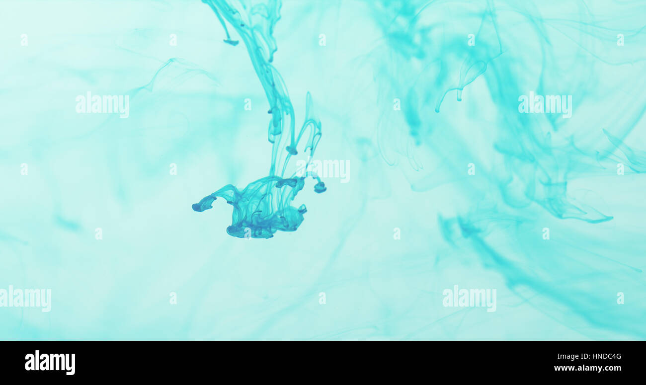 marine blue ink swirl in blue water, 4k photo Stock Photo - Alamy