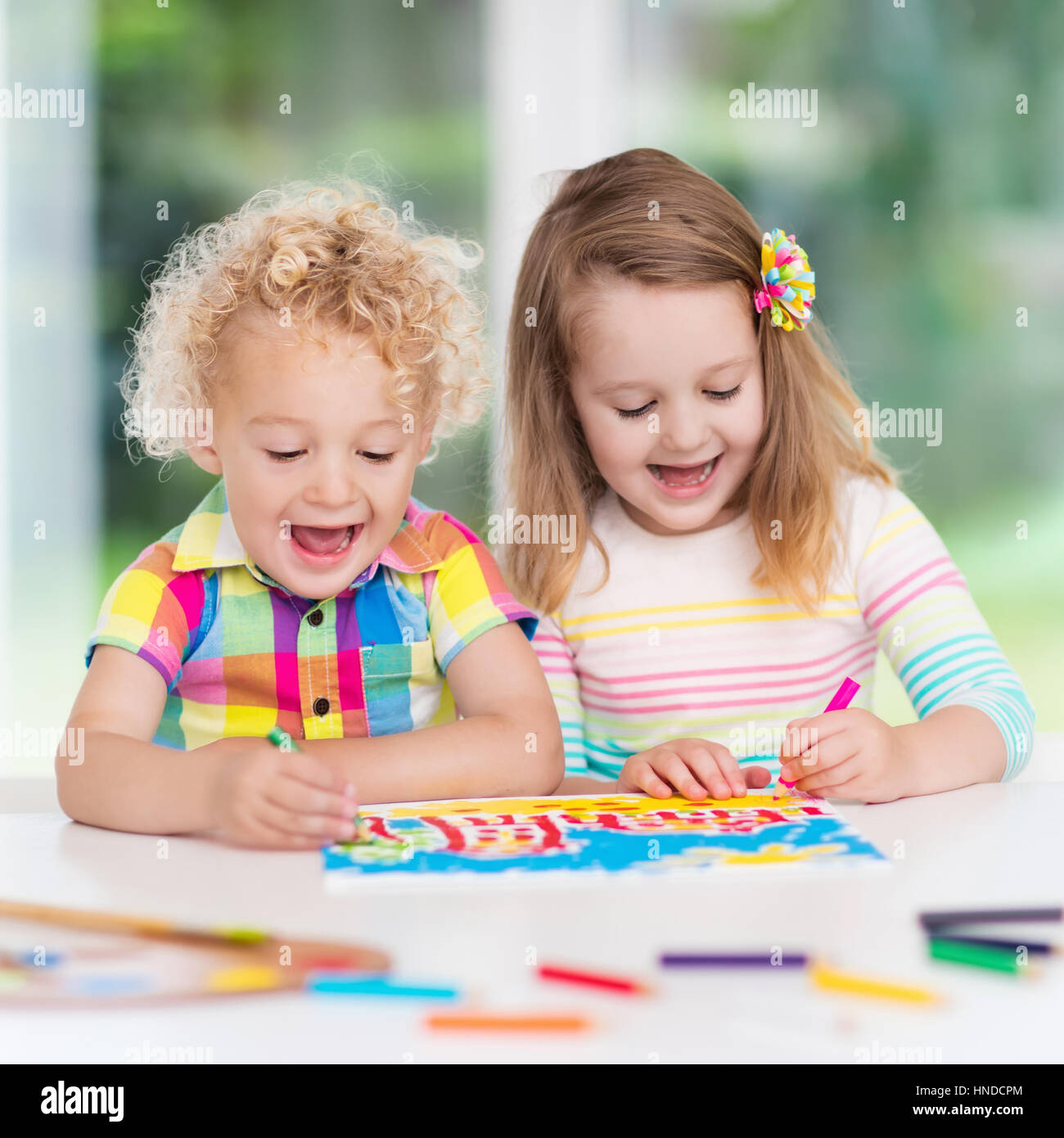 Little Boy And Girl Draw Together In White Room With Window Kids Doing Homework Painting And Drawing Children Paint With Paintbrush Color And Penci Stock Photo Alamy Little Boy And Girl Draw Together In White Room With Window Kids Doing Homework Painting And Drawing Children Paint With Paintbrush Color And Penci Stock Photo Alamy