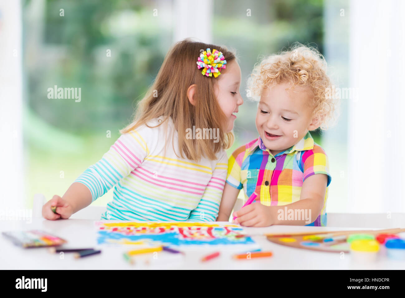 Little Boy And Girl Draw Together In White Room With Window Kids Doing Homework Painting And Drawing Children Paint With Paintbrush Color And Penci Stock Photo Alamy Little Boy And Girl Draw Together In White Room With Window Kids Doing Homework Painting And Drawing Children Paint With Paintbrush Color And Penci Stock Photo Alamy