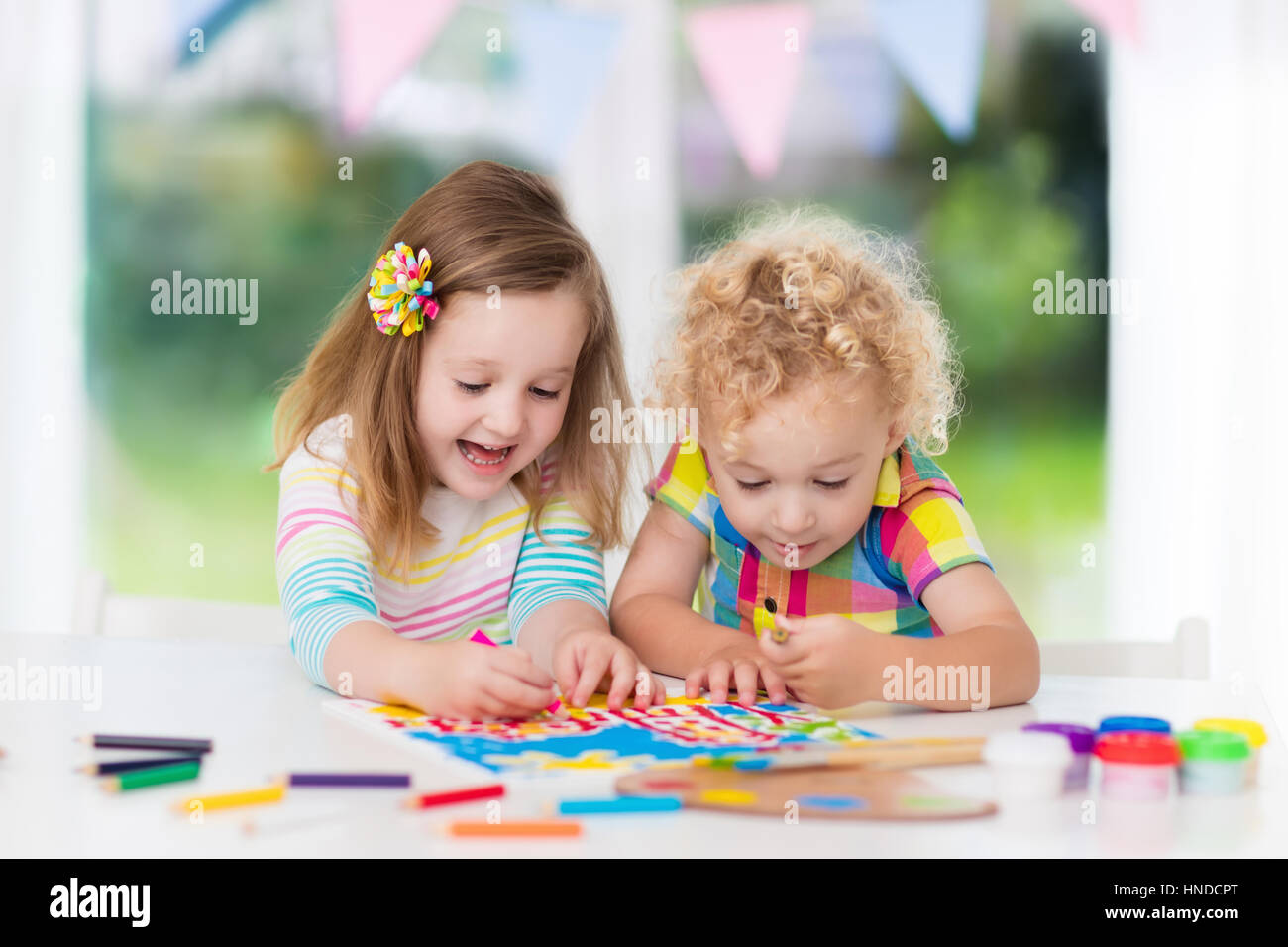 Little Boy And Girl Draw Together In White Room With Window Kids Doing Homework Painting And Drawing Children Paint With Paintbrush Color And Penci Stock Photo Alamy Little Boy And Girl Draw Together In White Room With Window Kids Doing Homework Painting And Drawing Children Paint With Paintbrush Color And Penci Stock Photo Alamy