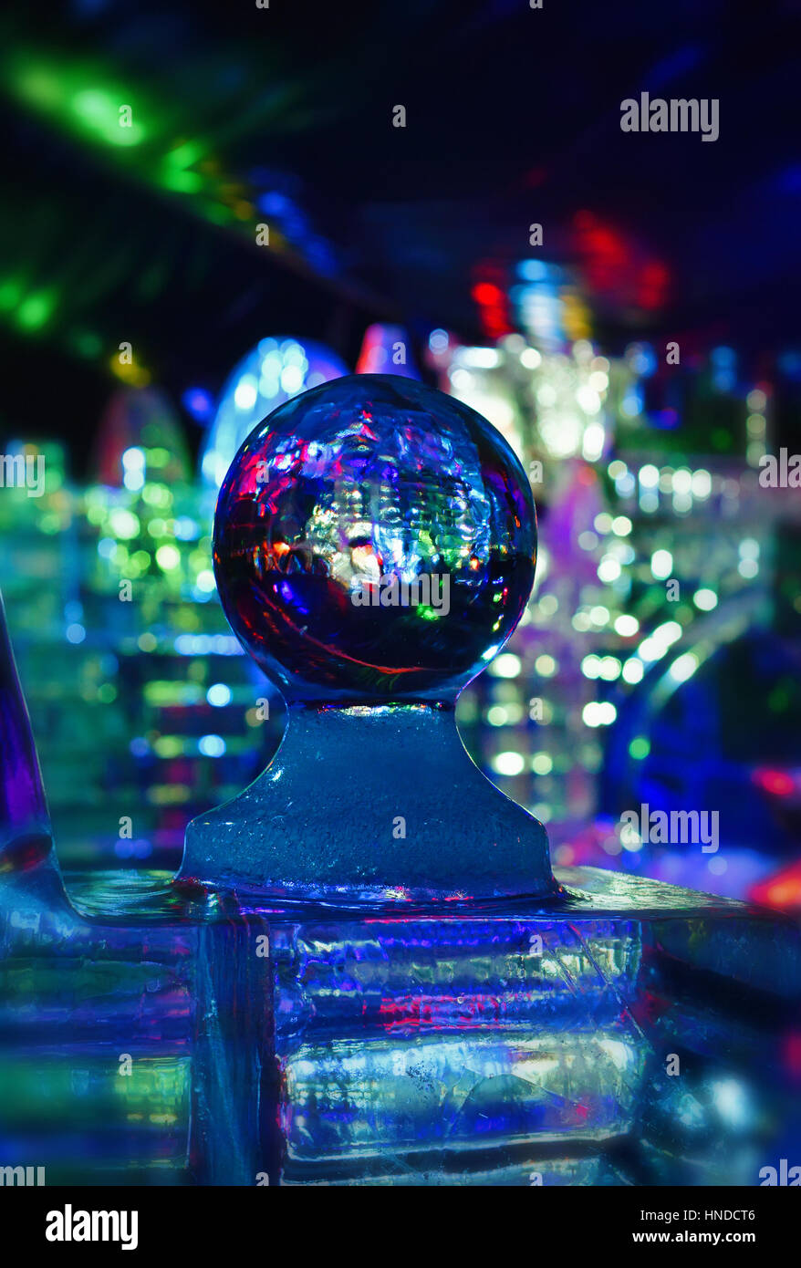 Detail of a sculpture made of ice with multicolored lights Stock Photo ...